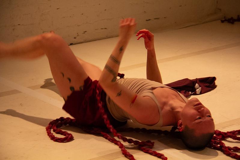 A performance still from MOMMA!